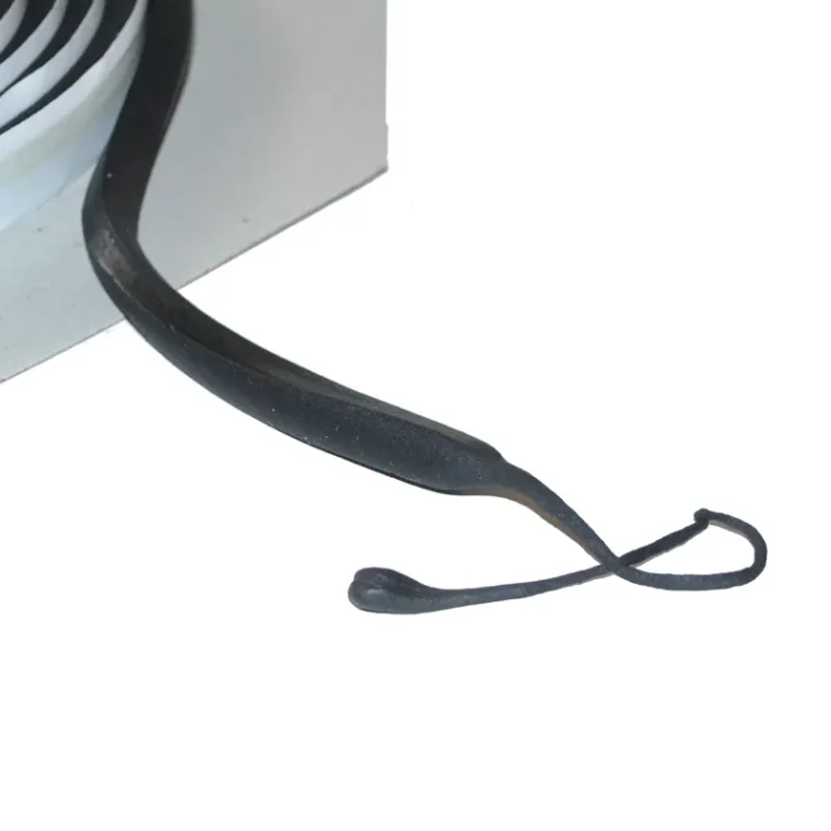 Close-up of black hot melt sealant tape