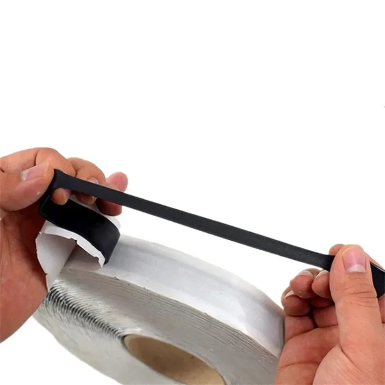 Self-adhesive gap seal tape for roofing applications