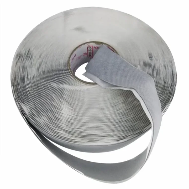 Application of non-woven fabric sealing tape on a surface