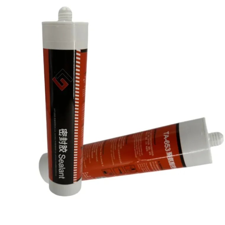White polyurethane caulk sealer applied on window frame